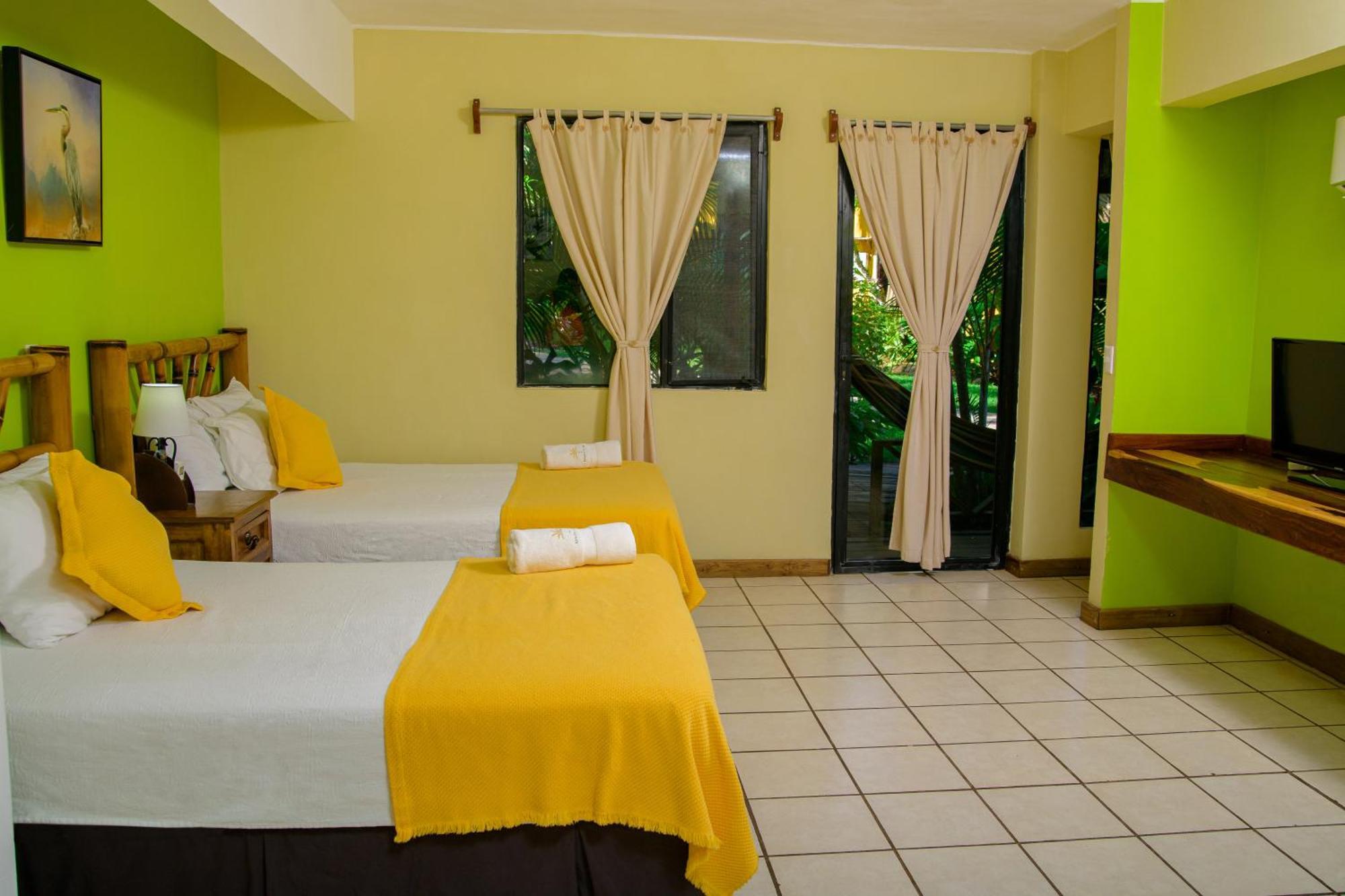 Banana Palms Hotel Rio Dulce Town Extérieur photo